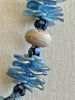 Blue Rose Petal with Aja Vaz Lamp-Work Bead Hawaiian Lei Mini (5 Cluster)  - 25"