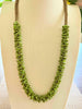 Earthy Green Orchid Lei with small rose petal beads - 28”